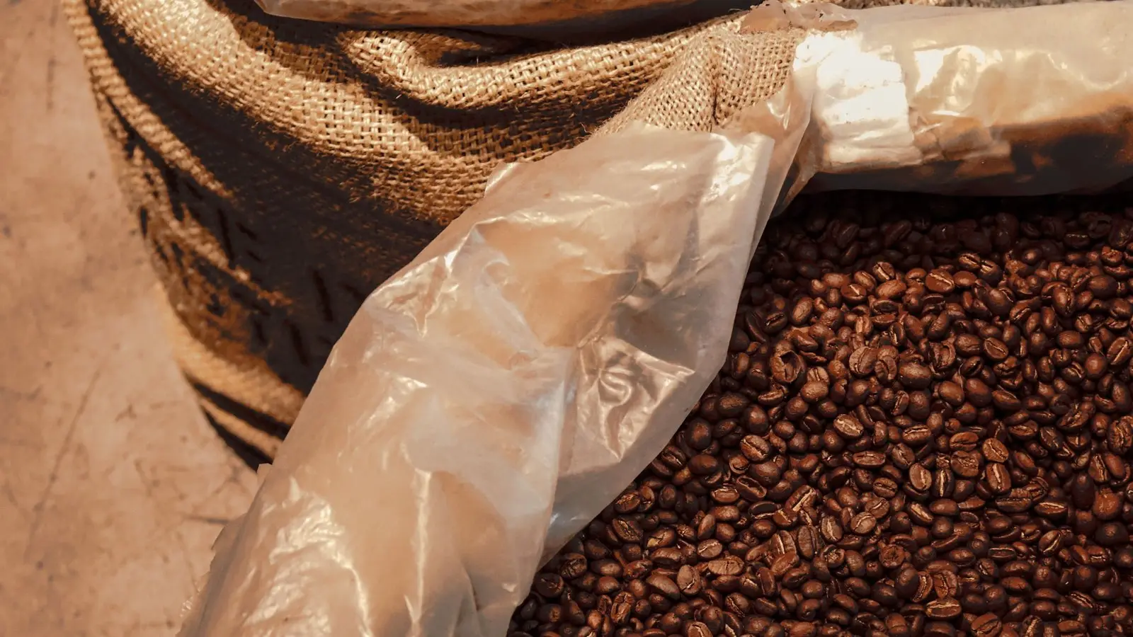 Open sacks filled with coffee beans